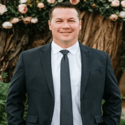 Dustin Person Headshot 2 1